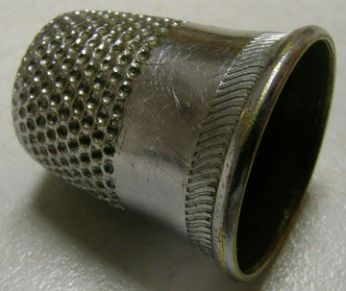 thimble, meaning of thimble in Longman Dictionary of Contemporary English
