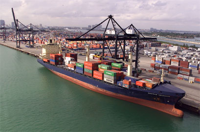 A container ship docks at the Miami seaport. Apparel Search Directory of ocean freight